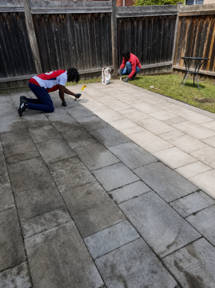 Applying jointing sand to a finished paver patio