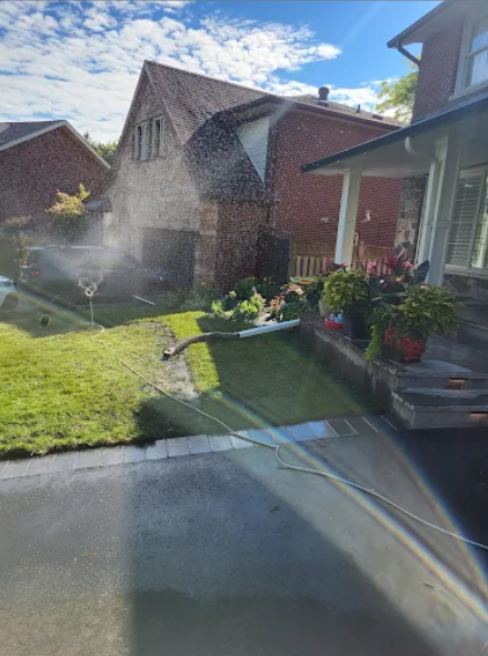 Watering a newly installed front lawn